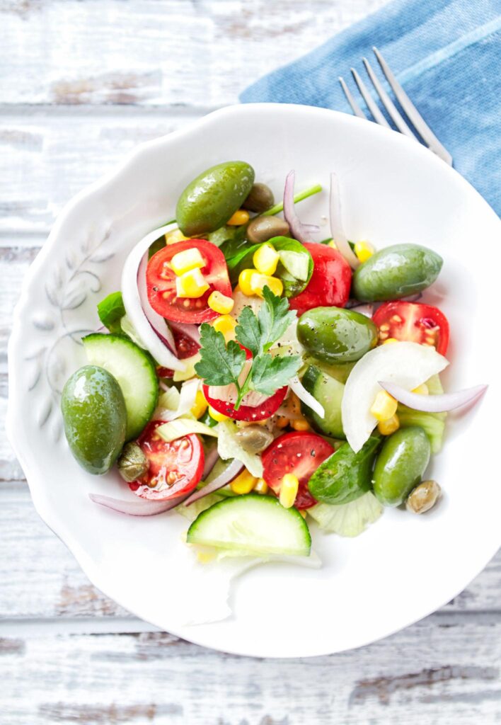 Mediterranean bowl with cherry tomatoes olives and cucumber